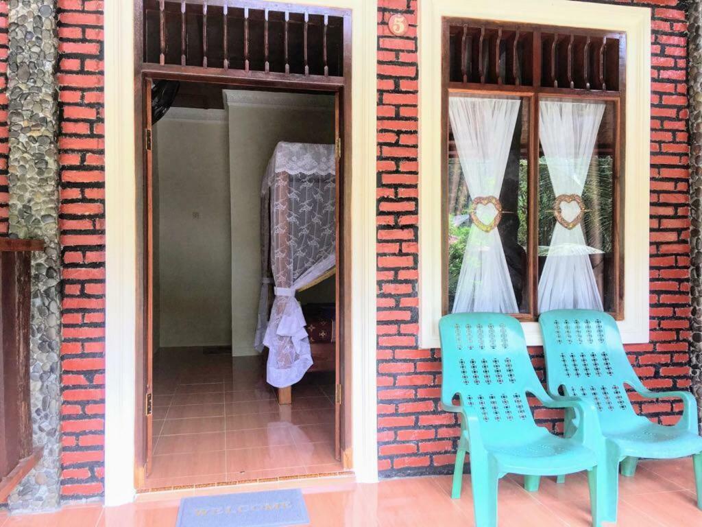 Sahnan Guest House Bukit Lawang Exterior photo